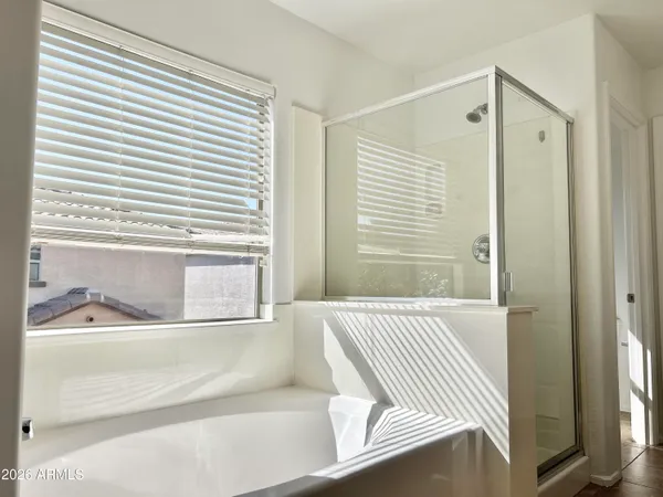 a bathroom with a double vanity sink mirror and double