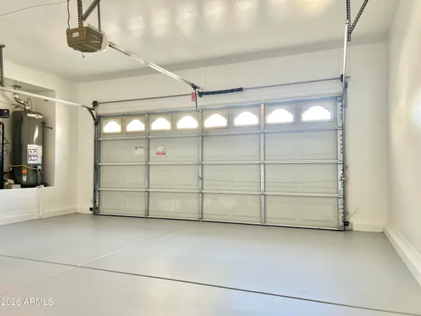 a view of a house with a yard and plants