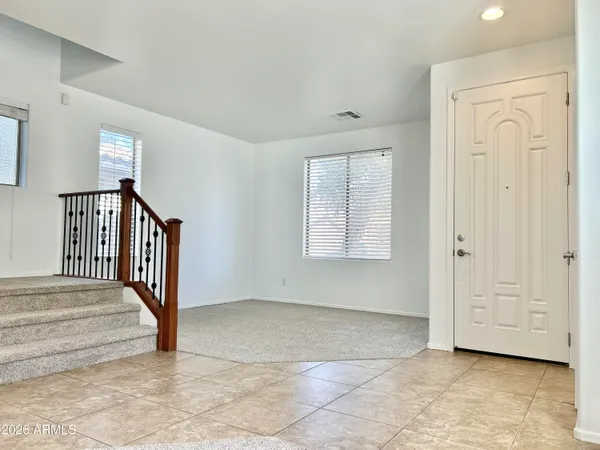 a view of an entryway with a livingroom