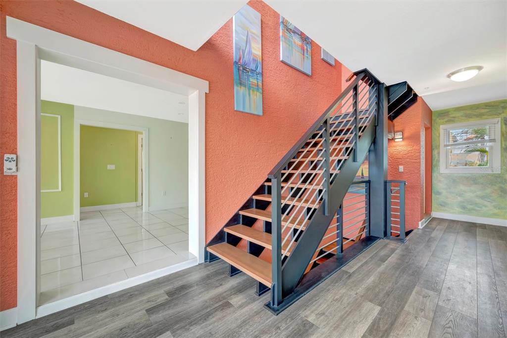 614 Norton Street Longboat Key, FL 34228 - Photo 12 of 71 a view of an entryway with staircase