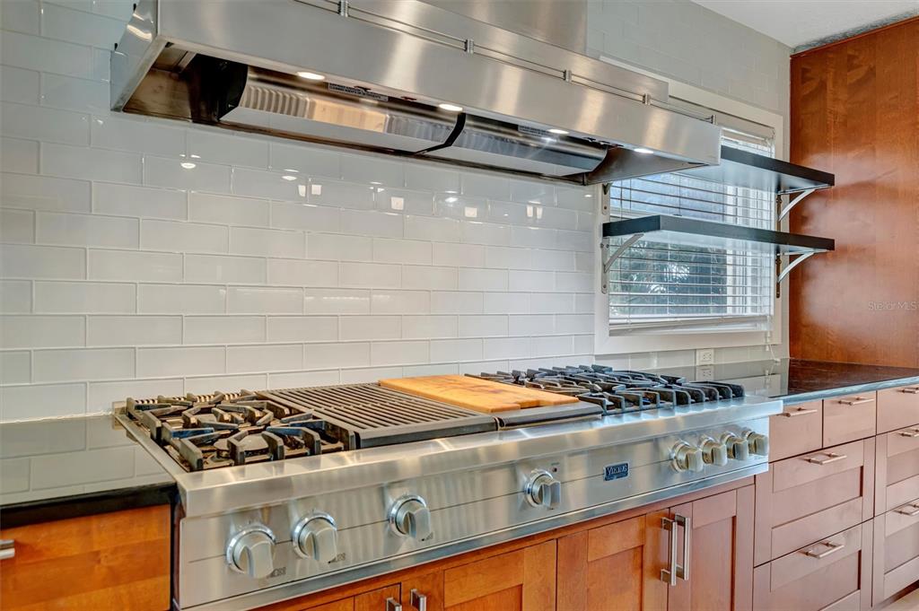 614 Norton Street Longboat Key, FL 34228 - Photo 25 of 71 a stove top oven sitting inside of a kitchen