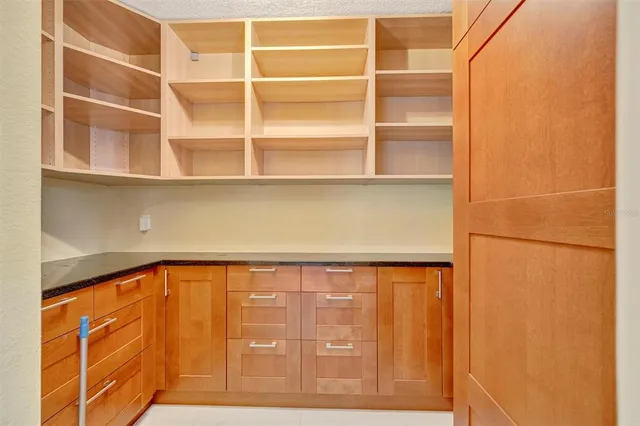 a big room with windows and closet