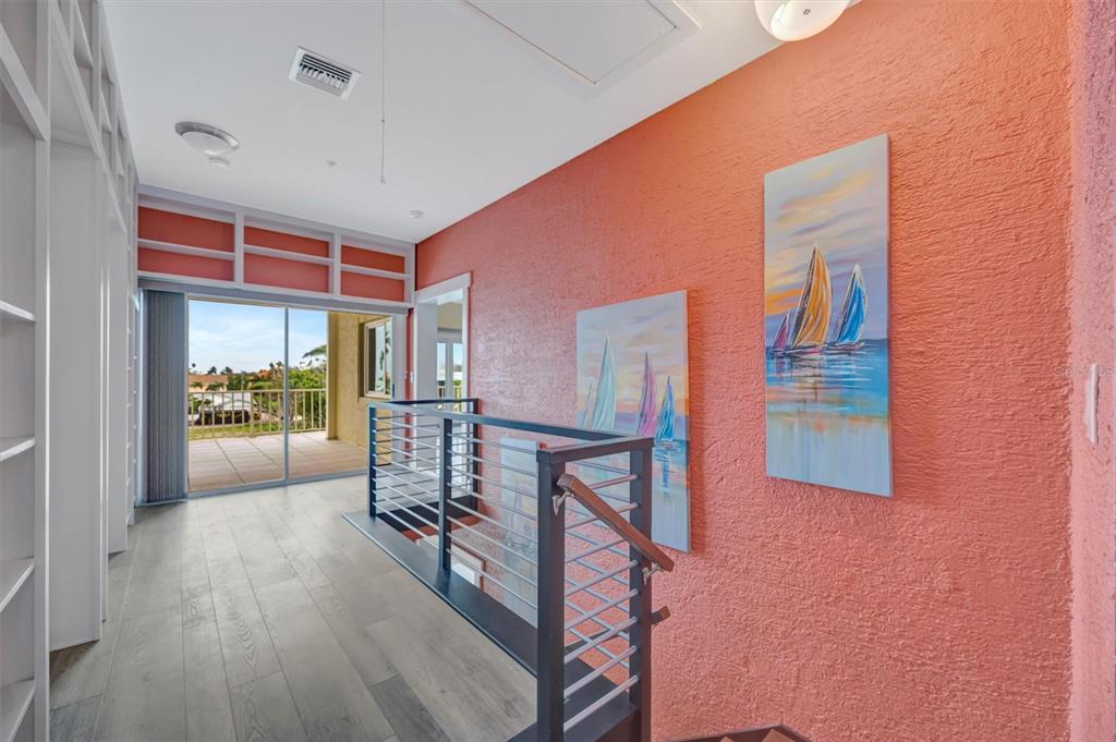 614 Norton Street Longboat Key, FL 34228 - Photo 39 of 71 a view of livingroom with furniture wooden floor and window