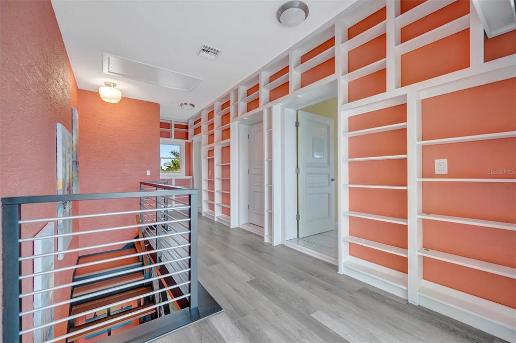 614 Norton Street Longboat Key, FL 34228 - Photo 40 of 71 a view of walk in closet with empty racks