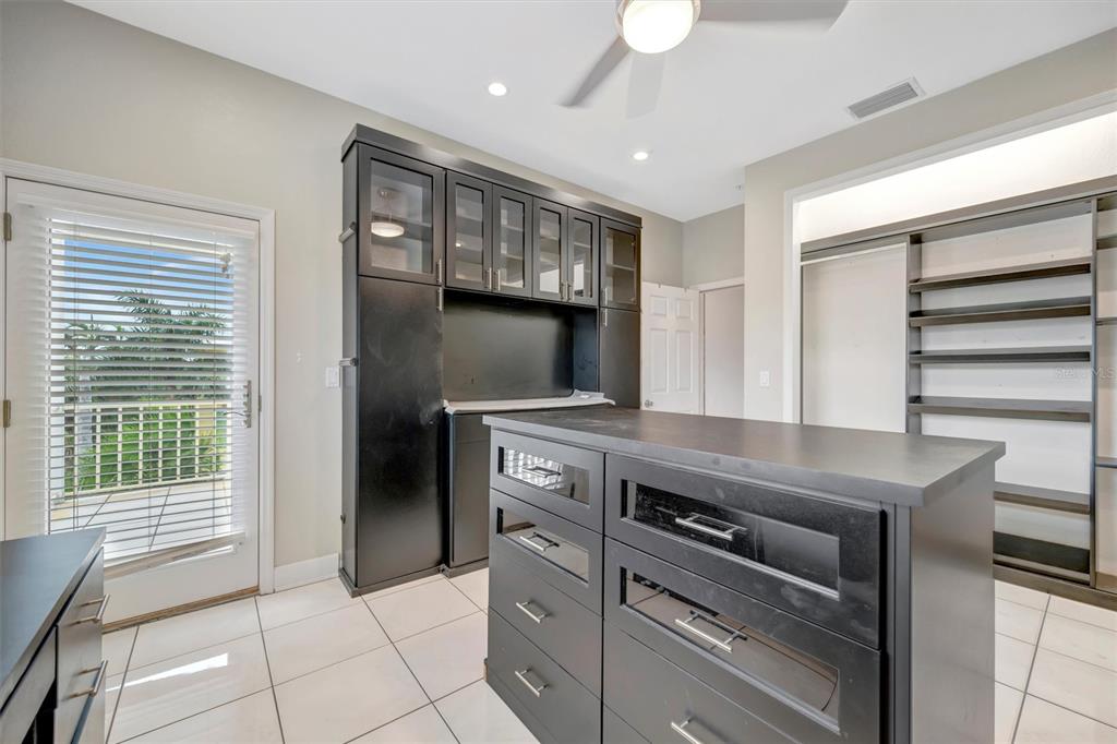 614 Norton Street Longboat Key, FL 34228 - Photo 55 of 71 a kitchen with a stove and a refrigerator
