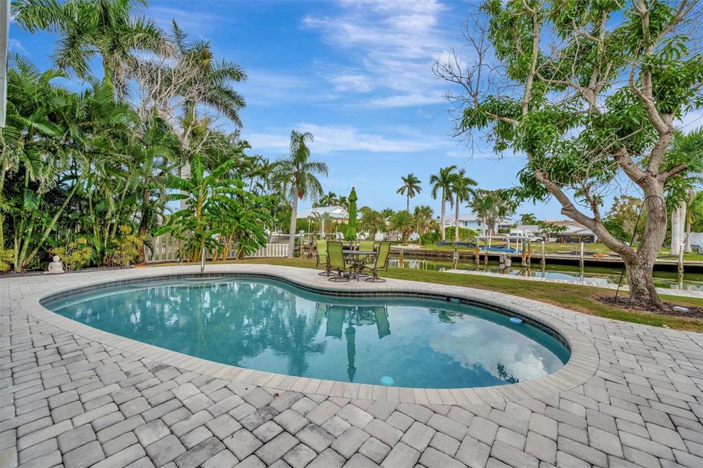614 Norton Street Longboat Key, FL 34228 - Photo 66 of 71 a view of swimming pool having outdoor seating