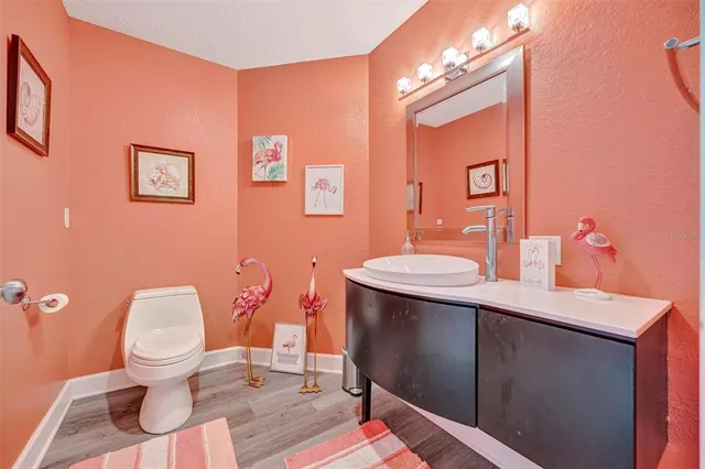 a view of a chairs and table in the balcony