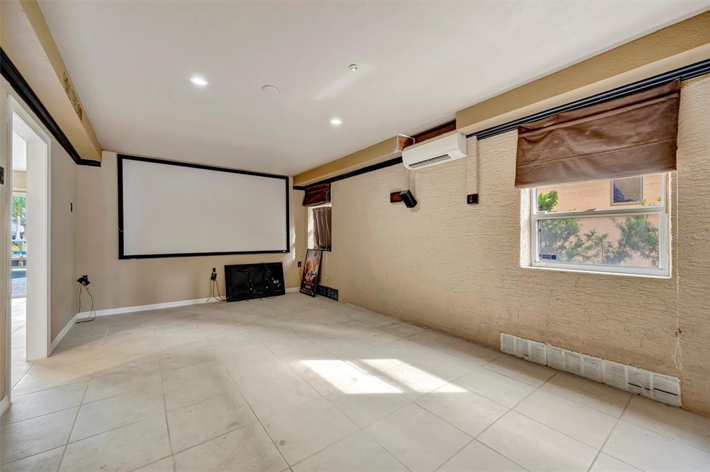 614 Norton Street Longboat Key, FL 34228 - Photo 10 of 71 a view of an empty room with a window