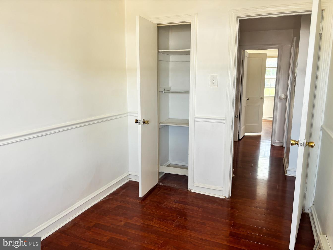 6034 Hasbrook Avenue Philadelphia, PA 19111 - Photo 13 of 14 a view of a hallway with wooden floor