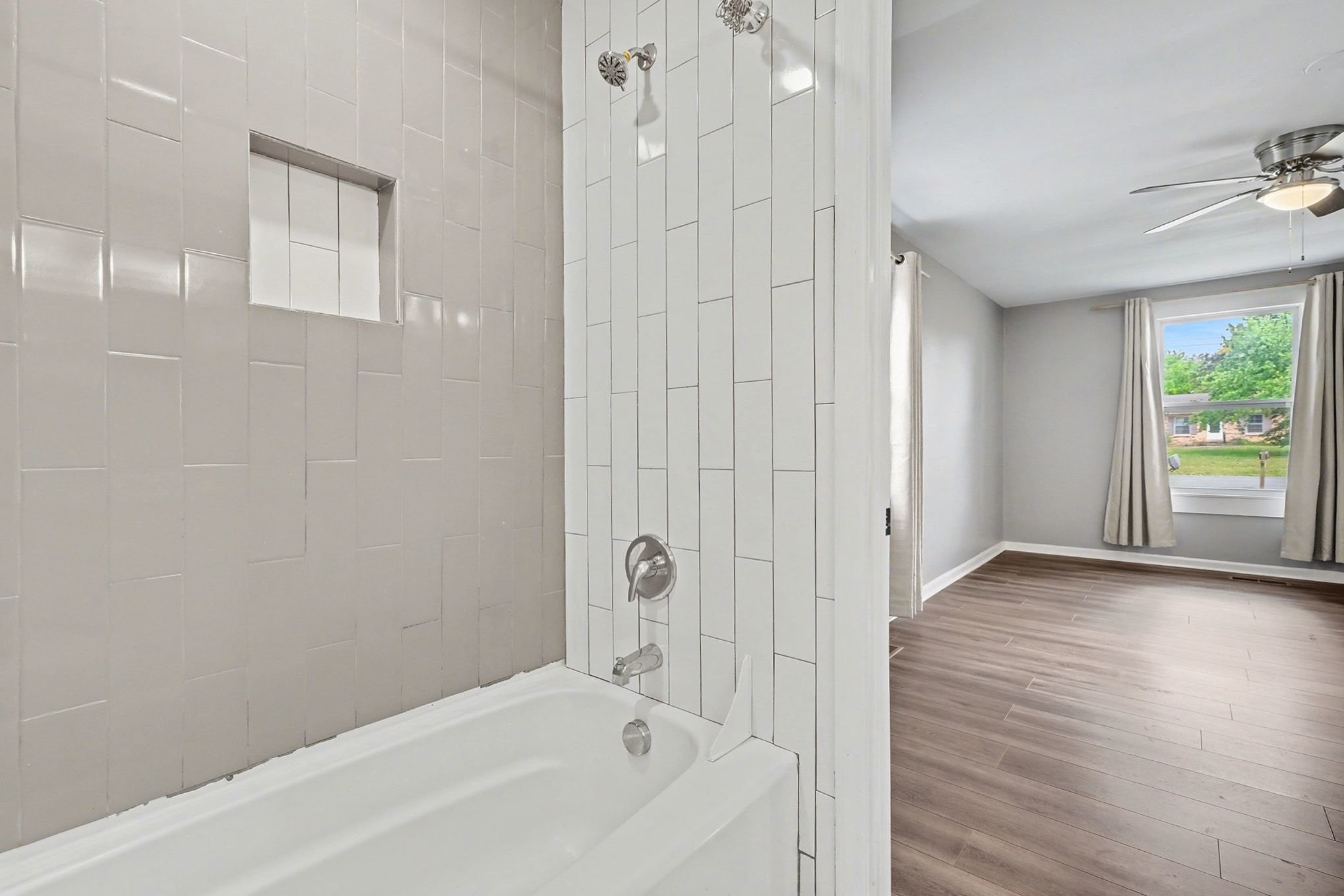 1214 Rutherford Street Murfreesboro, TN 37130 - Photo 19 of 32 a bathroom with a bathtub and shower
