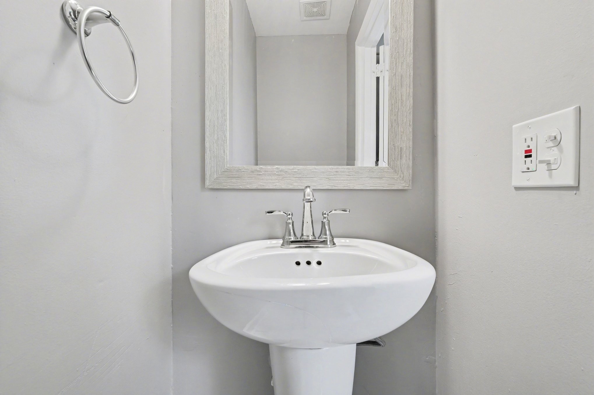 1214 Rutherford Street Murfreesboro, TN 37130 - Photo 24 of 32 a bathroom with a sink and a mirror
