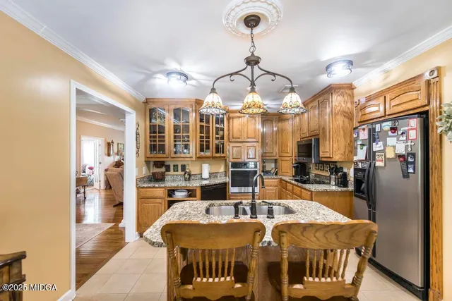 a very nice looking dining room with a table and chairs