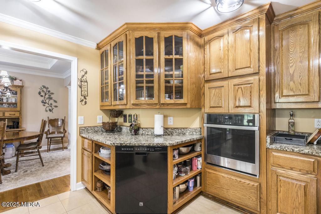 674 Mt Paran Road Lizella, GA 31052 - Photo 14 of 45 a kitchen with stainless steel appliances granite countertop a stove and a sink