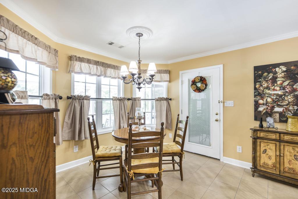 674 Mt Paran Road Lizella, GA 31052 - Photo 17 of 45 a dining room with furniture and window