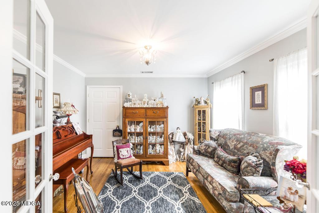 674 Mt Paran Road Lizella, GA 31052 - Photo 20 of 45 a living room with furniture and a flat screen tv
