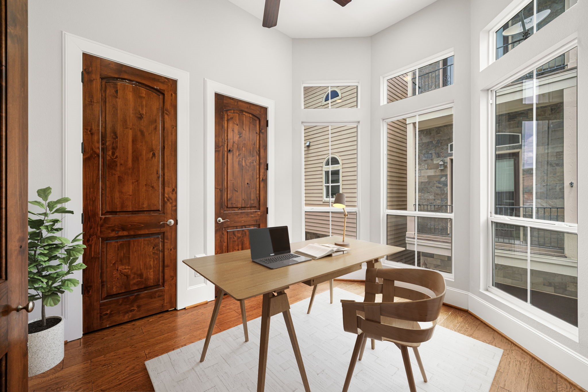 2022 Sabine Street Houston, TX 77007 - Photo 3 of 23 a view of a dining room with furniture window and wooden floor