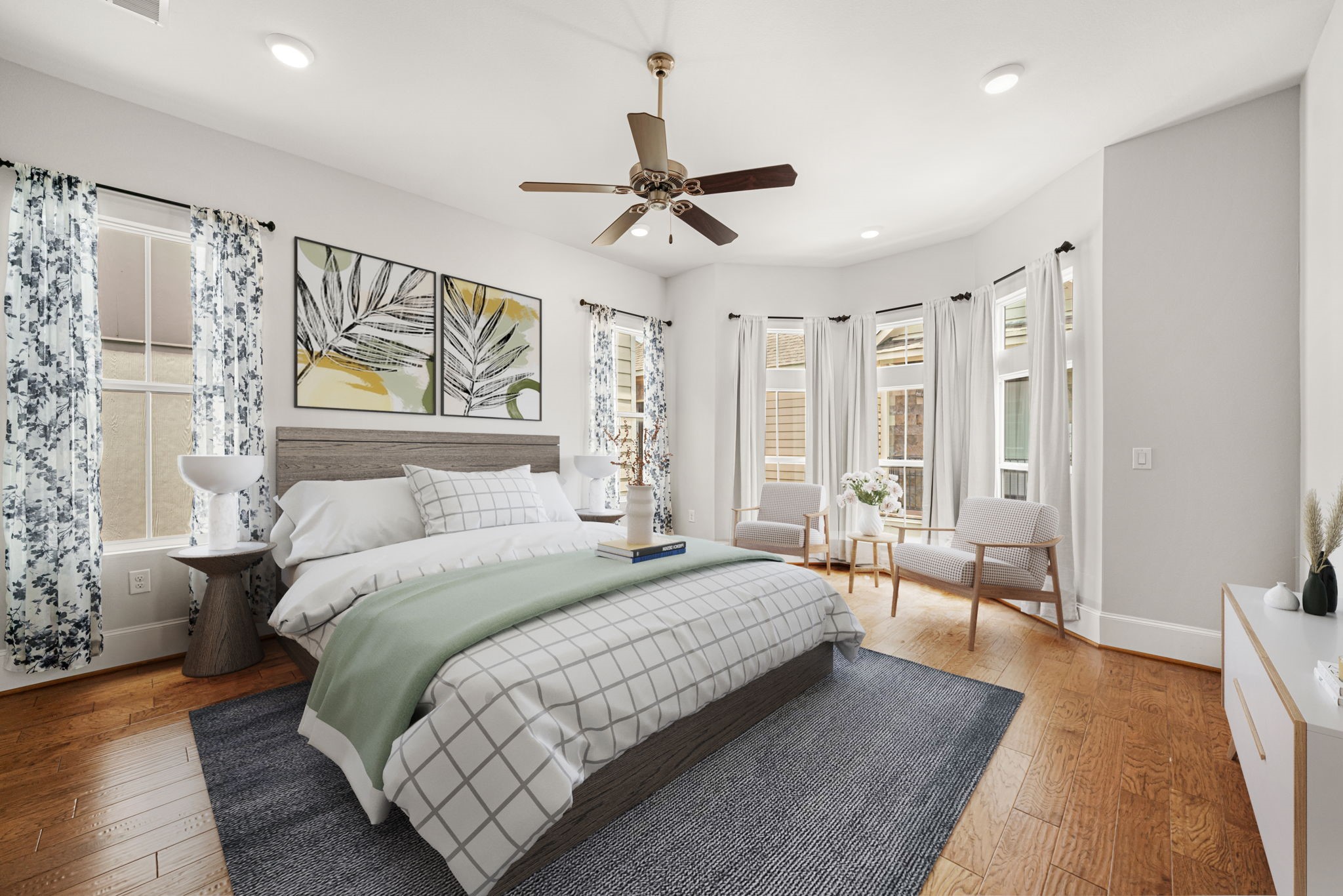 2022 Sabine Street Houston, TX 77007 - Photo 9 of 23 a spacious bedroom with a large bed and a chandelier