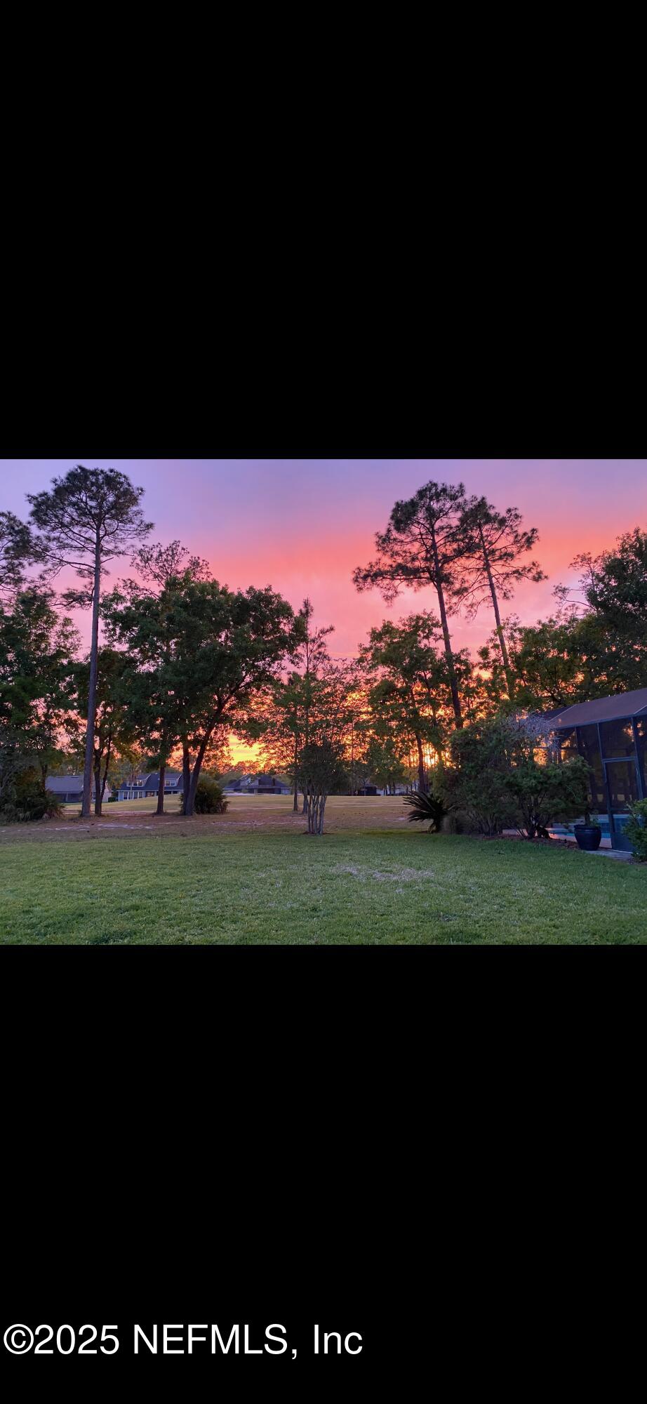 1741 Highland View Drive St. Augustine, FL 32092 - Photo 38 of 46 a view of a golf course with a lake