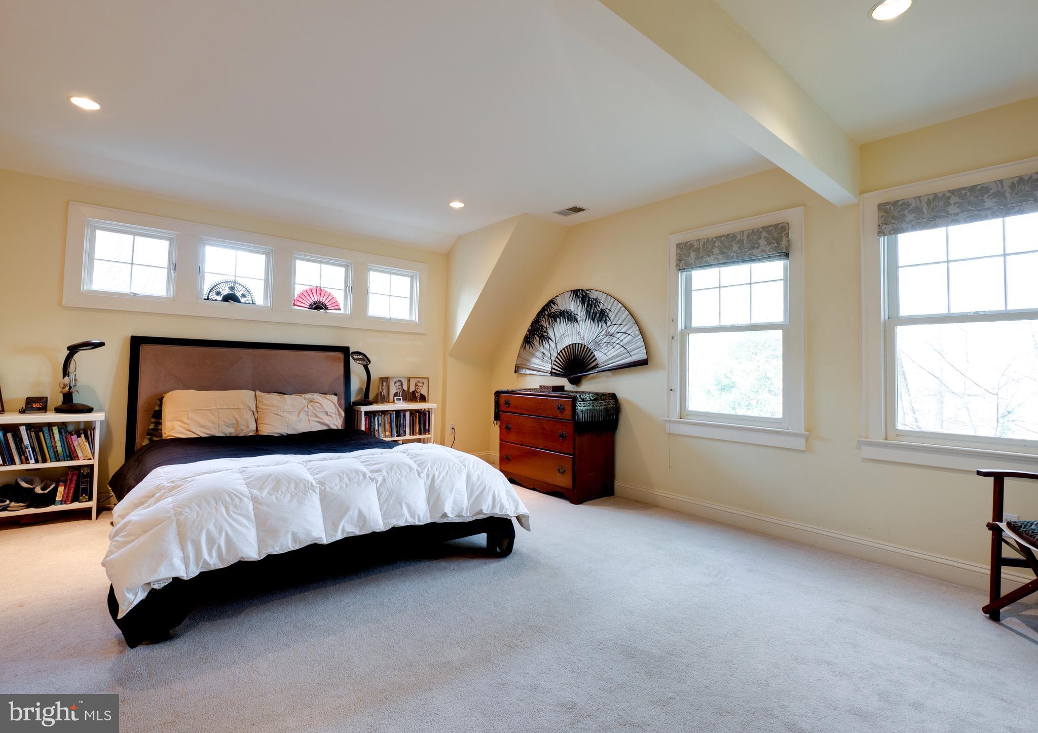6306 Valley Road Bethesda, MD 20817 - Photo 36 of 74 a bedroom with a bed and a window