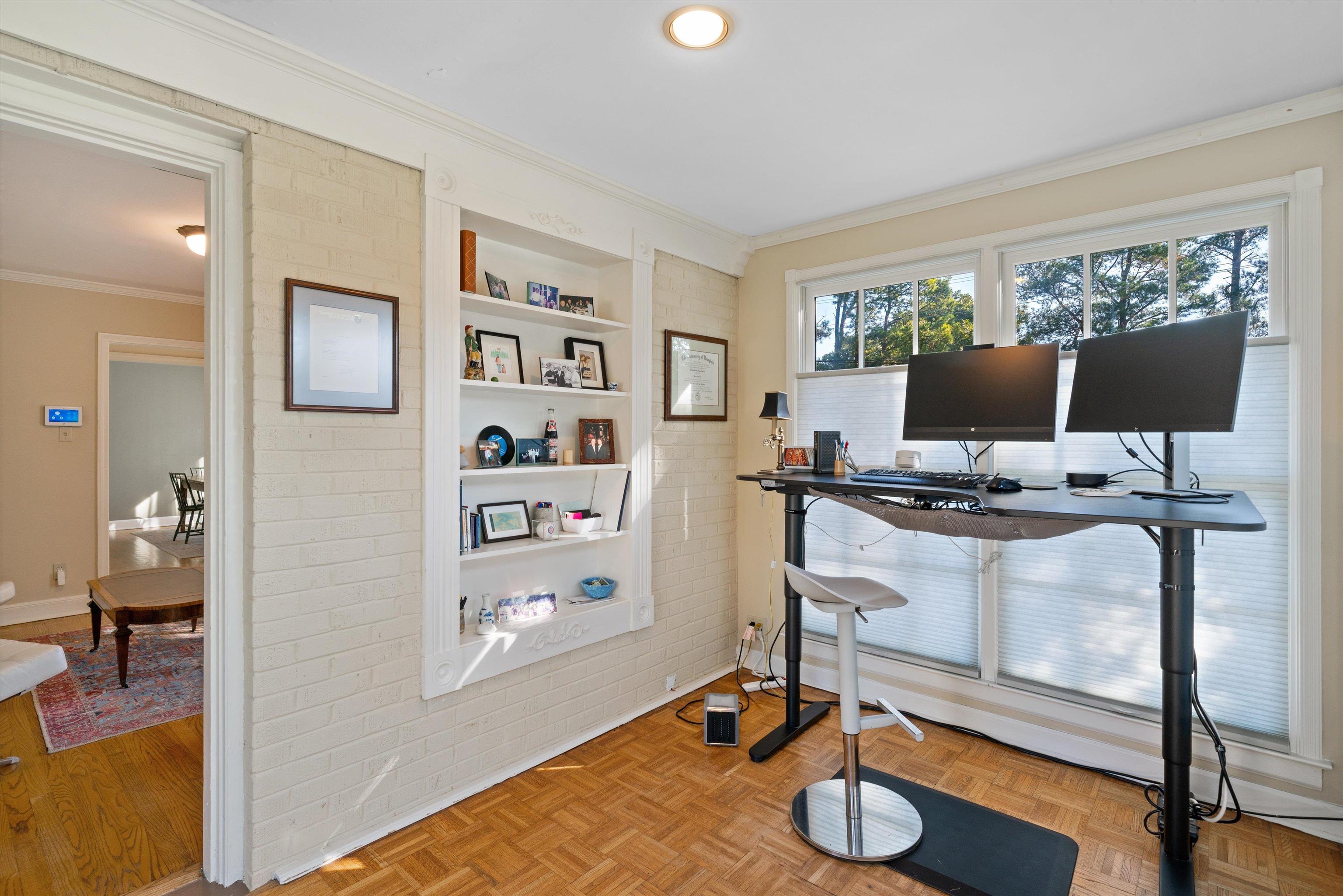 567 South Yates Road Memphis, TN 38120 - Photo 11 of 20 a view of a workspace with furniture and a window