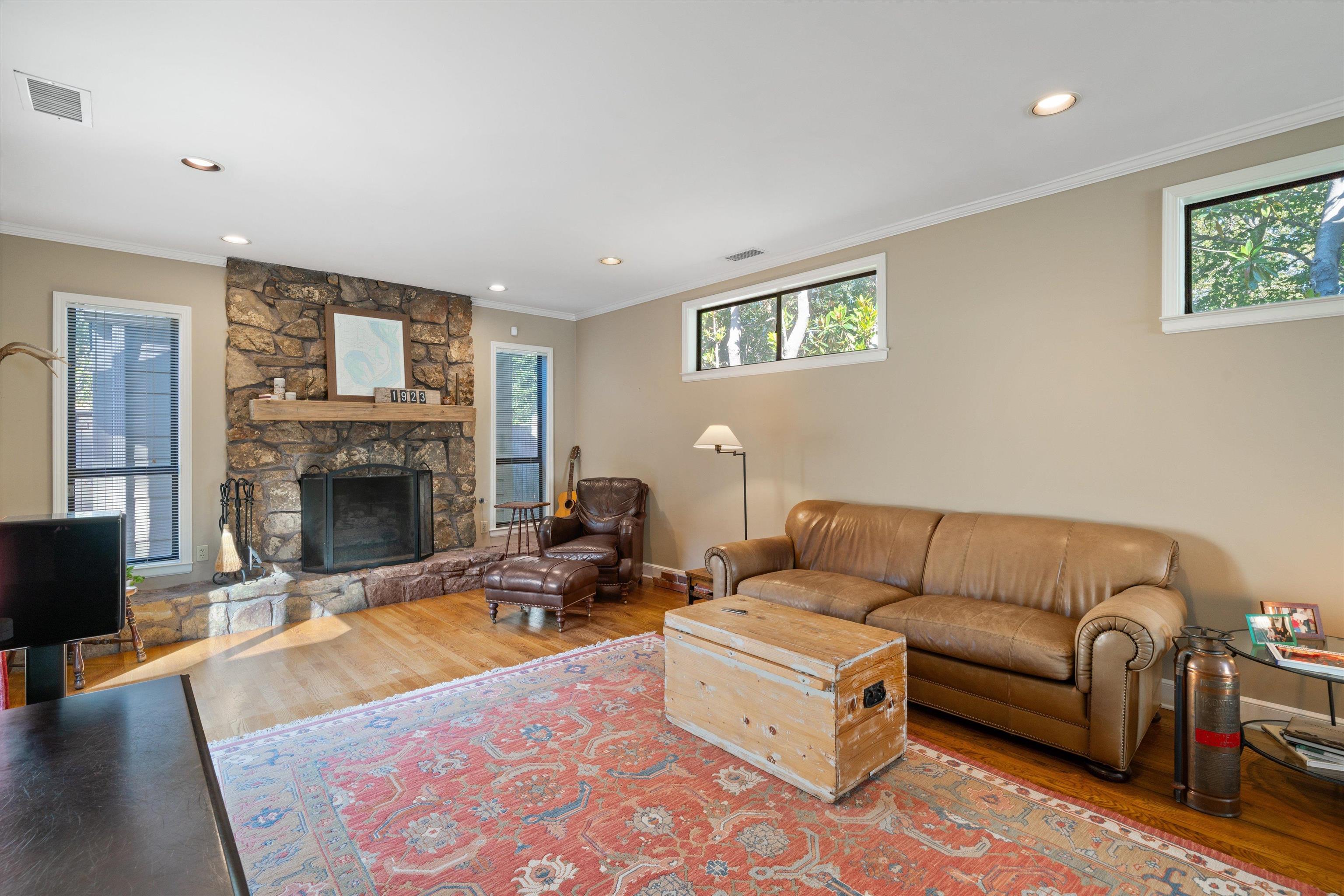 567 South Yates Road Memphis, TN 38120 - Photo 12 of 20 a living room with furniture and a fireplace