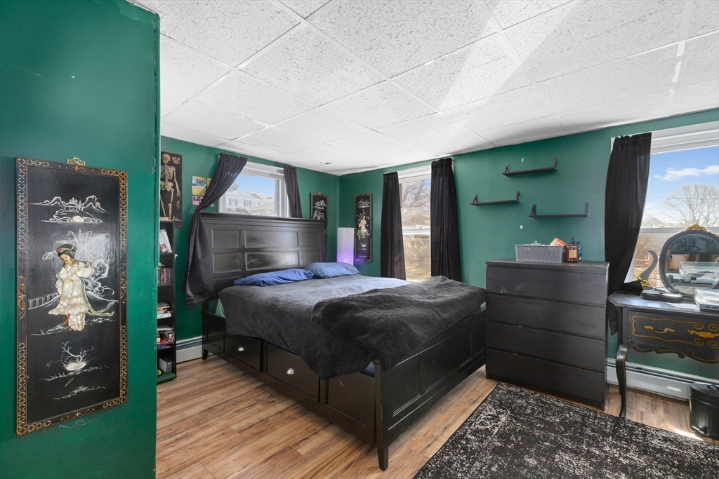 22 Montgomery Street Fall River, MA 02720 - Photo 11 of 22 a bedroom with a bed and a dresser