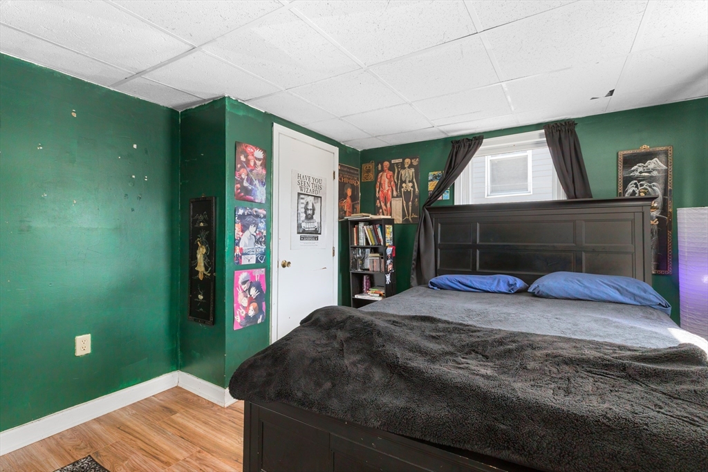 22 Montgomery Street Fall River, MA 02720 - Photo 12 of 22 a bedroom with a bed and a window