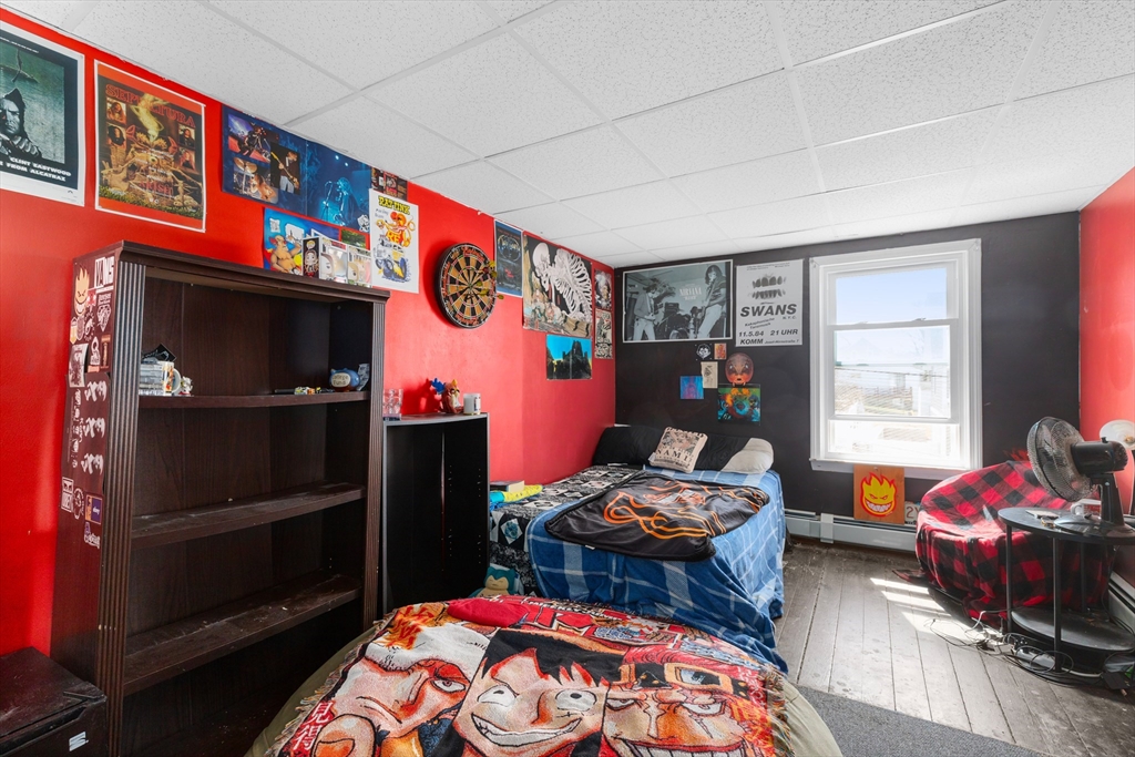 22 Montgomery Street Fall River, MA 02720 - Photo 17 of 22 a bedroom with two beds and a window