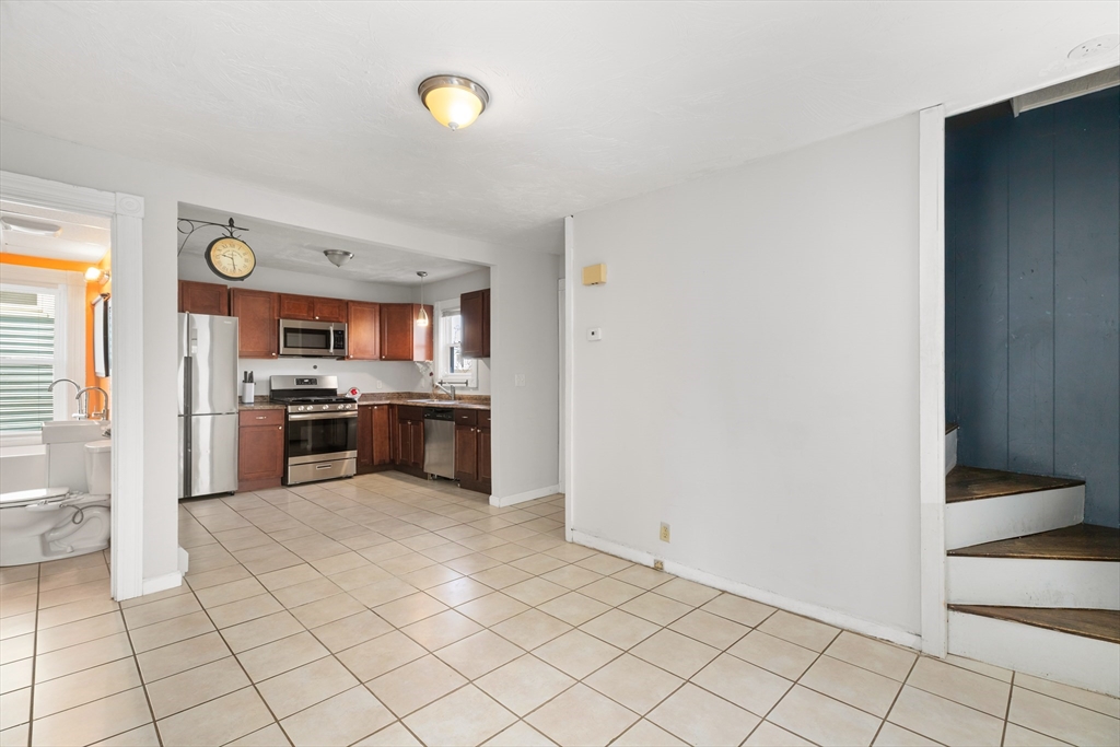 22 Montgomery Street Fall River, MA 02720 - Photo 4 of 22 a kitchen with a sink and cabinets