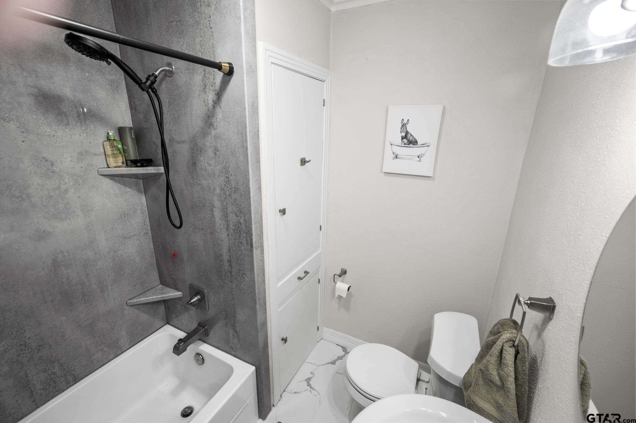 290 Lynch Street Hawkins, TX 75765 - Photo 19 of 36 a bathroom with a toilet sink and shower