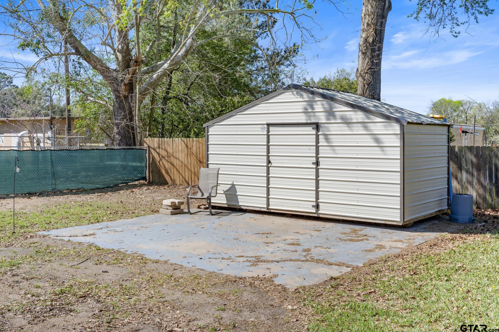 290 Lynch Street Hawkins, TX 75765 - Photo 24 of 36 a view of a house with a yard