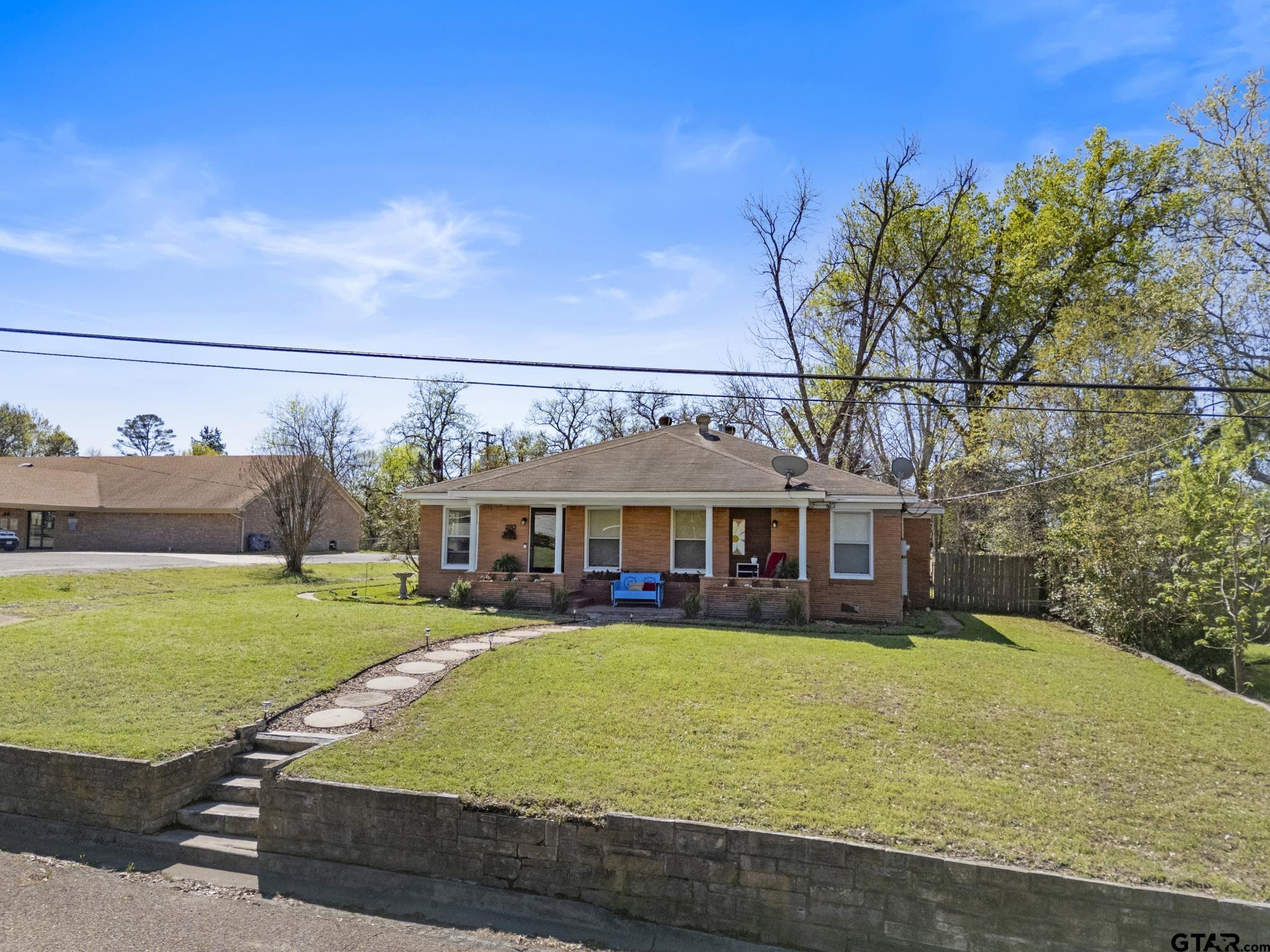 290 Lynch Street Hawkins, TX 75765 - Photo 29 of 36 front view of a house with a big yard