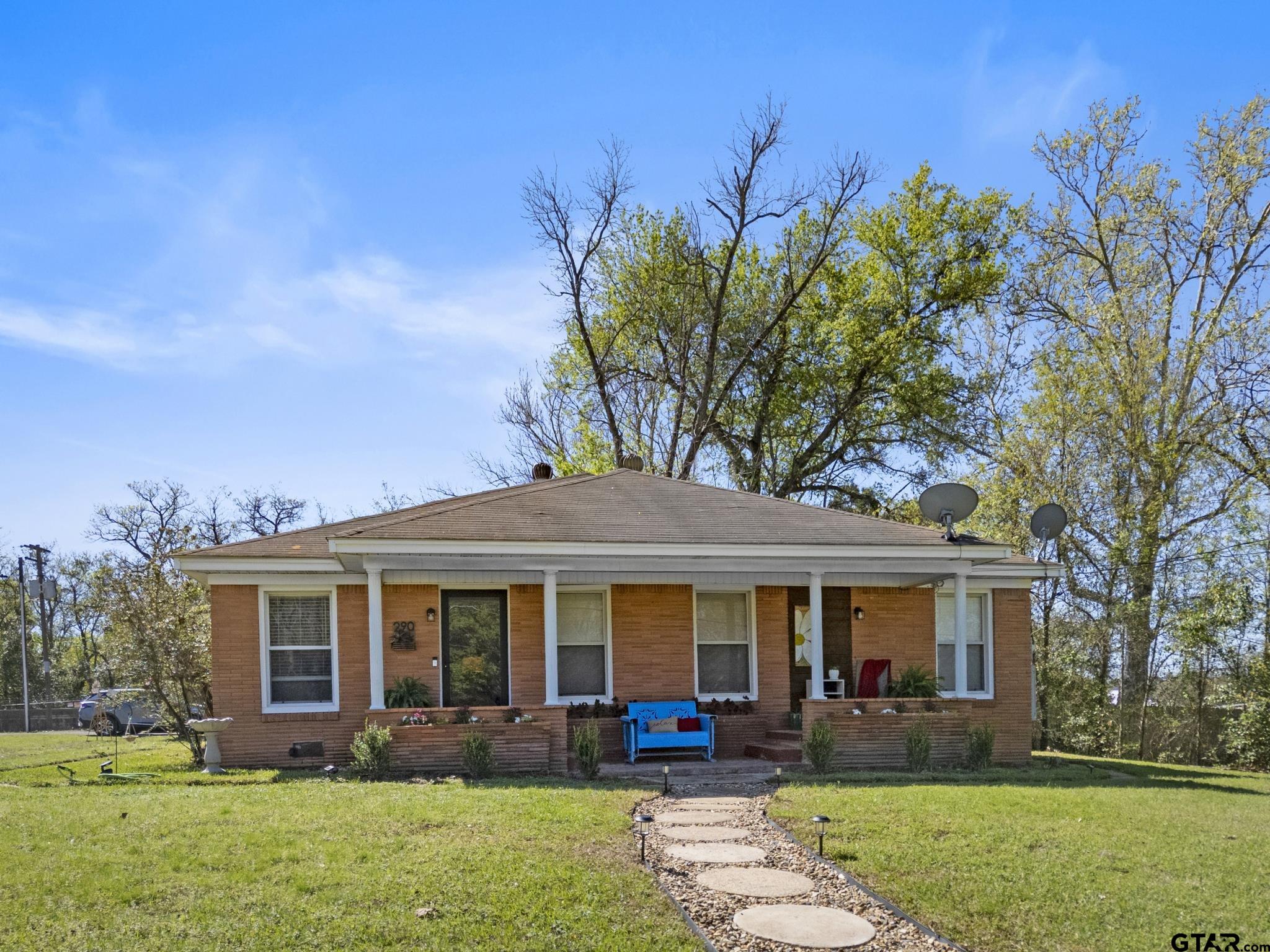 290 Lynch Street Hawkins, TX 75765 - Photo 32 of 36 a front view of a house with garden