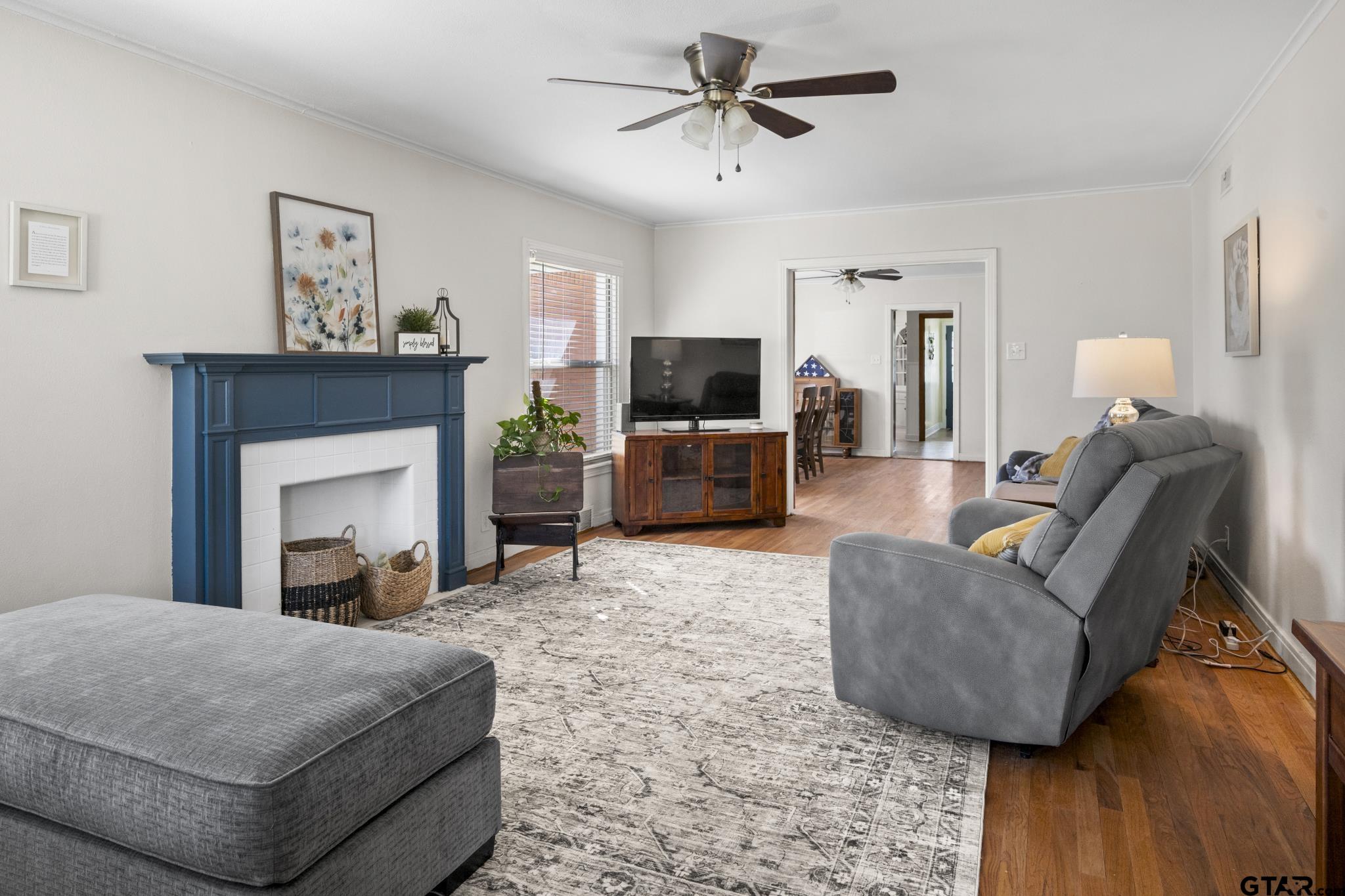 290 Lynch Street Hawkins, TX 75765 - Photo 5 of 36 a living room with furniture and a fireplace