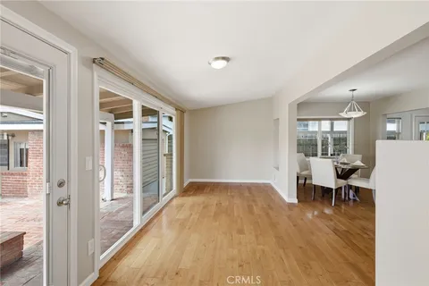 a view of a livingroom with furniture and wooden floor