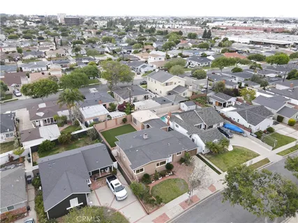 an aerial view of a house with a garden