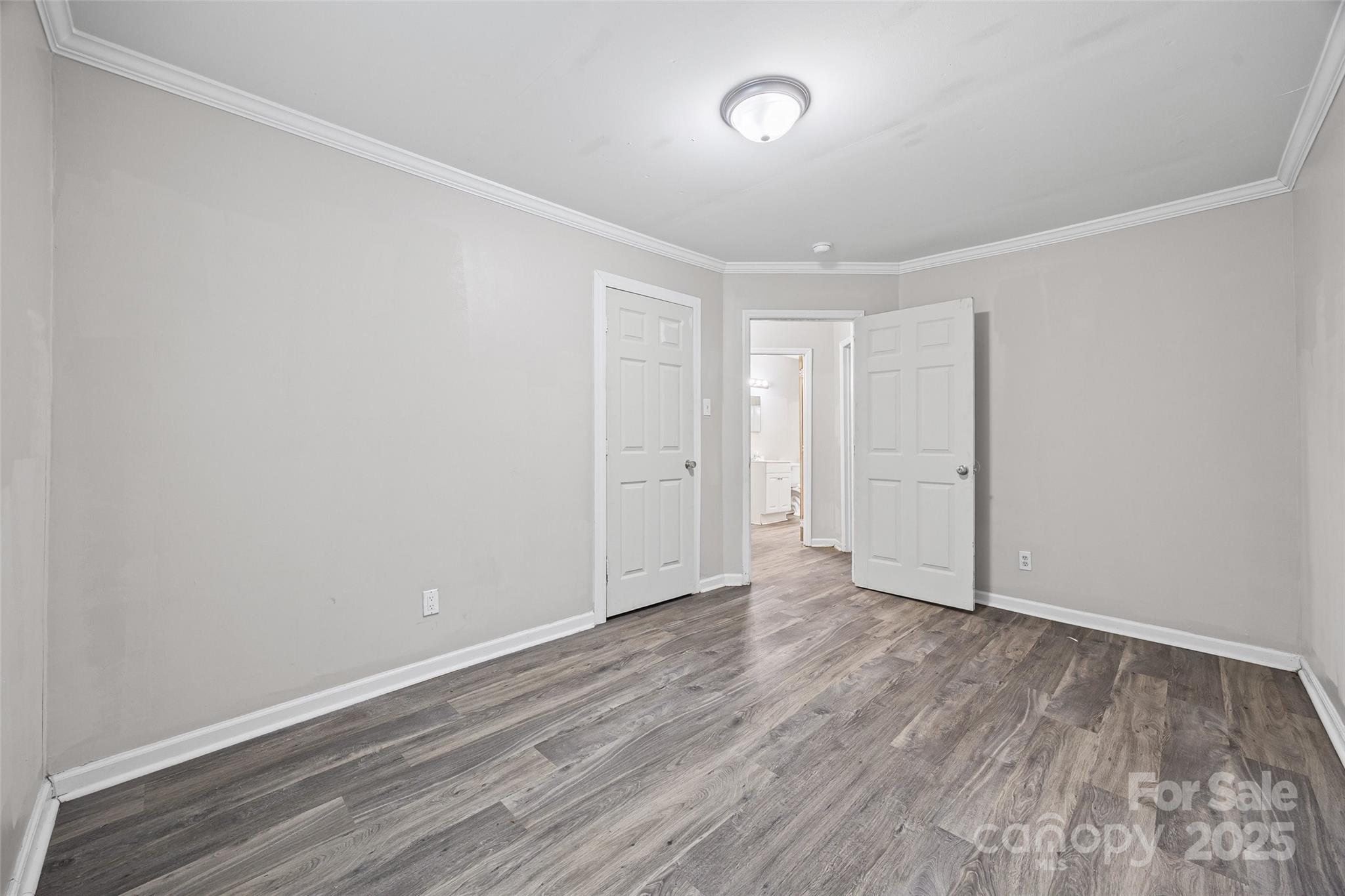 616 Simpson Street Rock Hill, SC 29730 - Photo 14 of 21 a view of an empty room with wooden floor