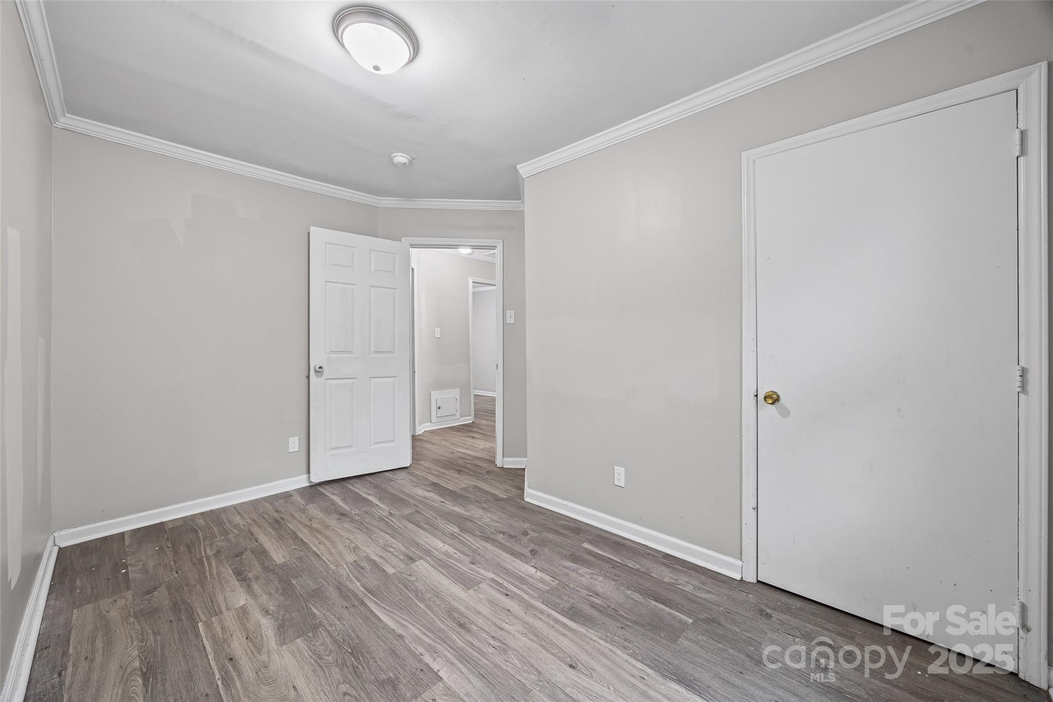 616 Simpson Street Rock Hill, SC 29730 - Photo 15 of 21 a view of an empty room with wooden floor