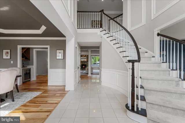 a bathroom with a shower sink and mirror