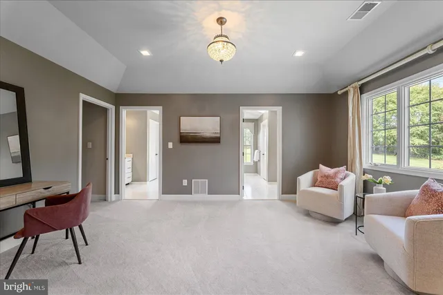 a view of an outdoor space and basketball court