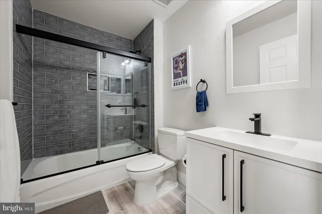 a view of a garden with a house in the background