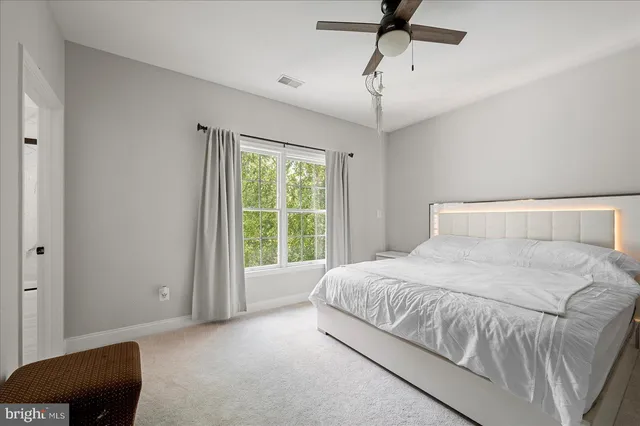 a front view of house with yard and outdoor seating