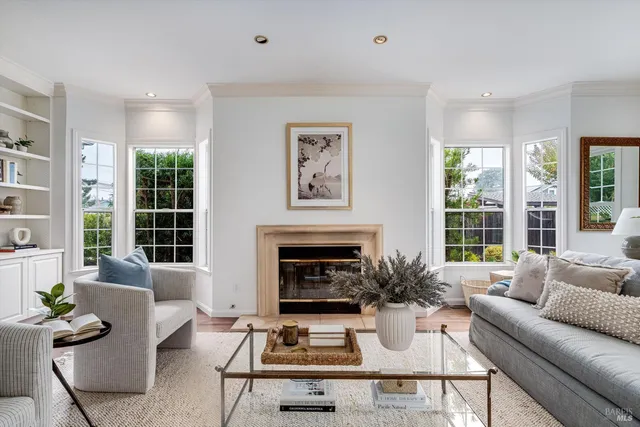 a bedroom with a bed and a potted plant