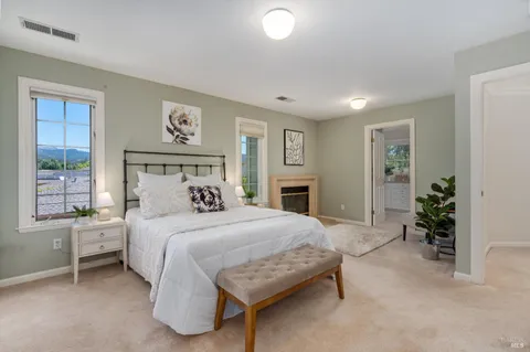 a view of a house with backyard and garden