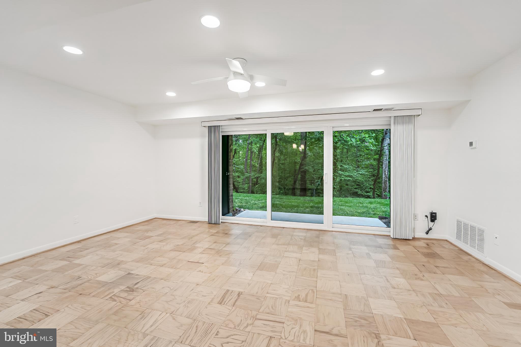 11619 Vantage Hill Road, Unit 2A Reston, VA 20190 - Photo 9 of 25 Living room with gorgeous views from your patio