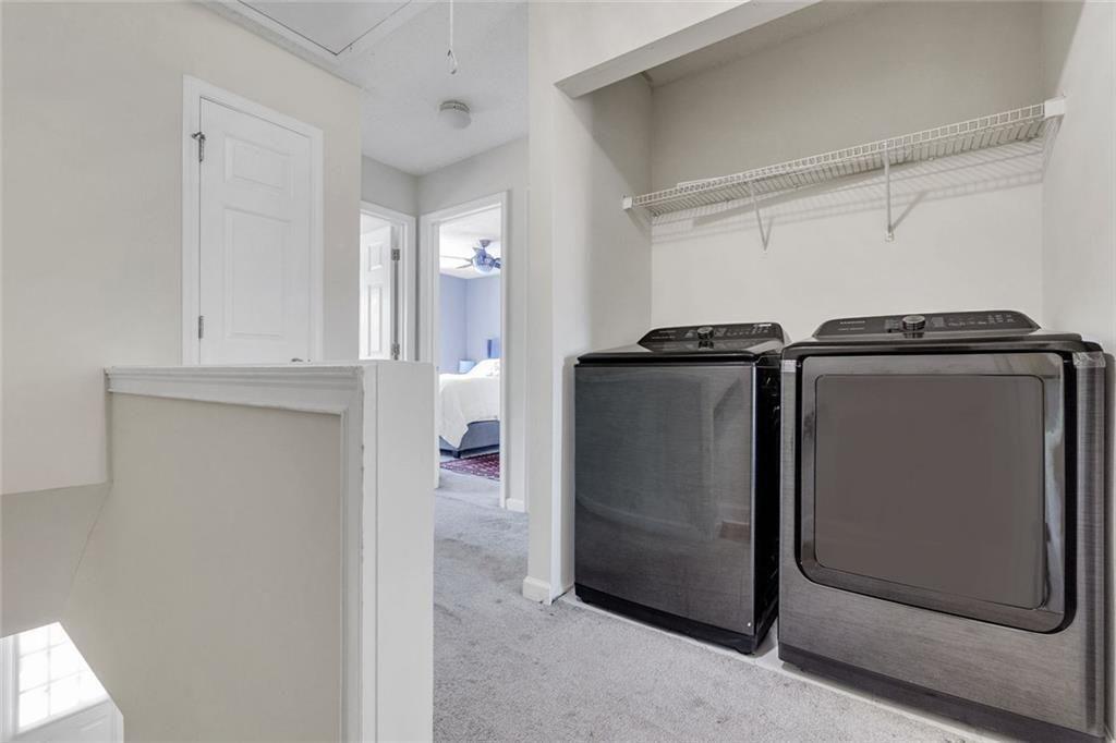13300 Morris Road, Unit 4 Alpharetta, GA 30004 - Photo 15 of 36 a view of a walk in closet