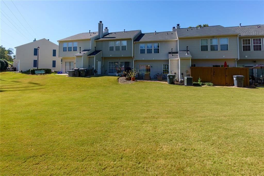 13300 Morris Road, Unit 4 Alpharetta, GA 30004 - Photo 24 of 36 a front view of a building with a ocean view