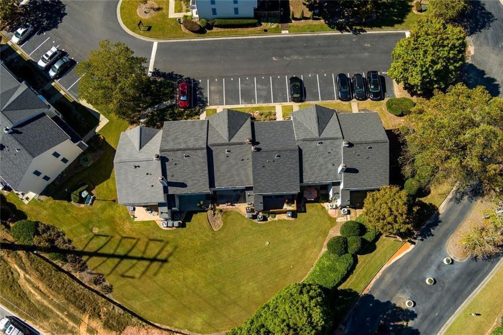 13300 Morris Road, Unit 4 Alpharetta, GA 30004 - Photo 33 of 36 an aerial view of a house with a swimming pool