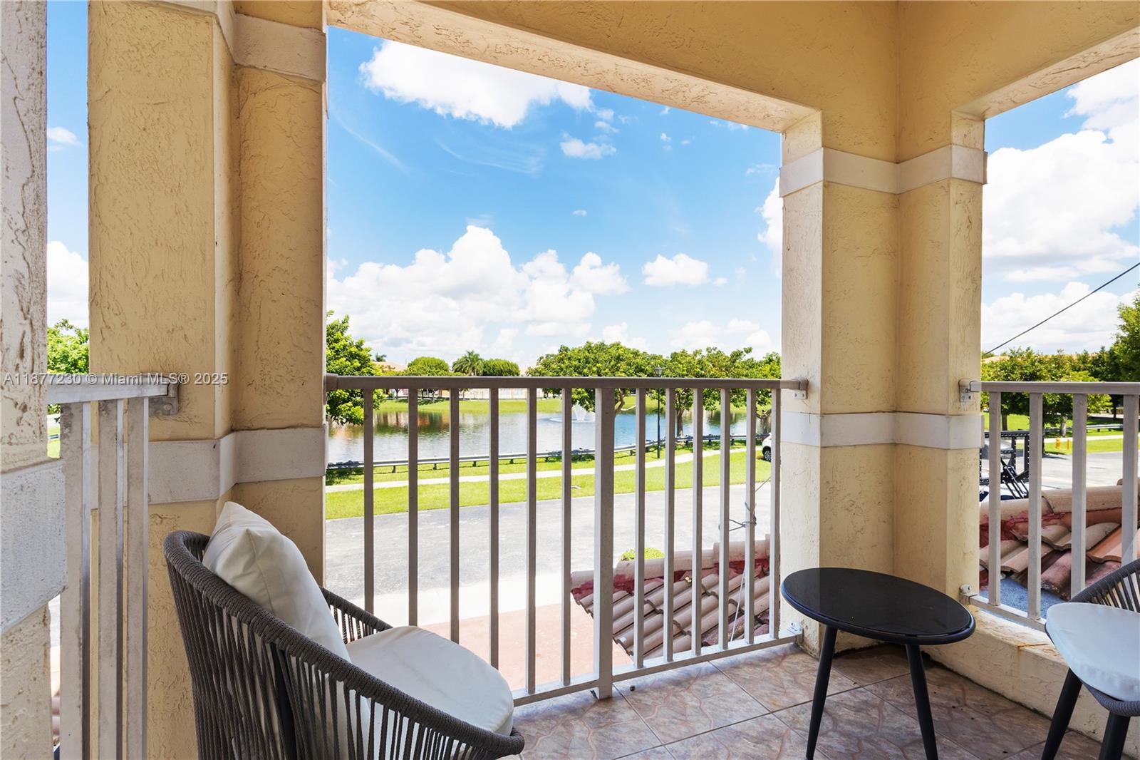 16256 Southwest 57th Lane Miami, FL 33193 - Photo 3 of 32 a view of a balcony with furniture
