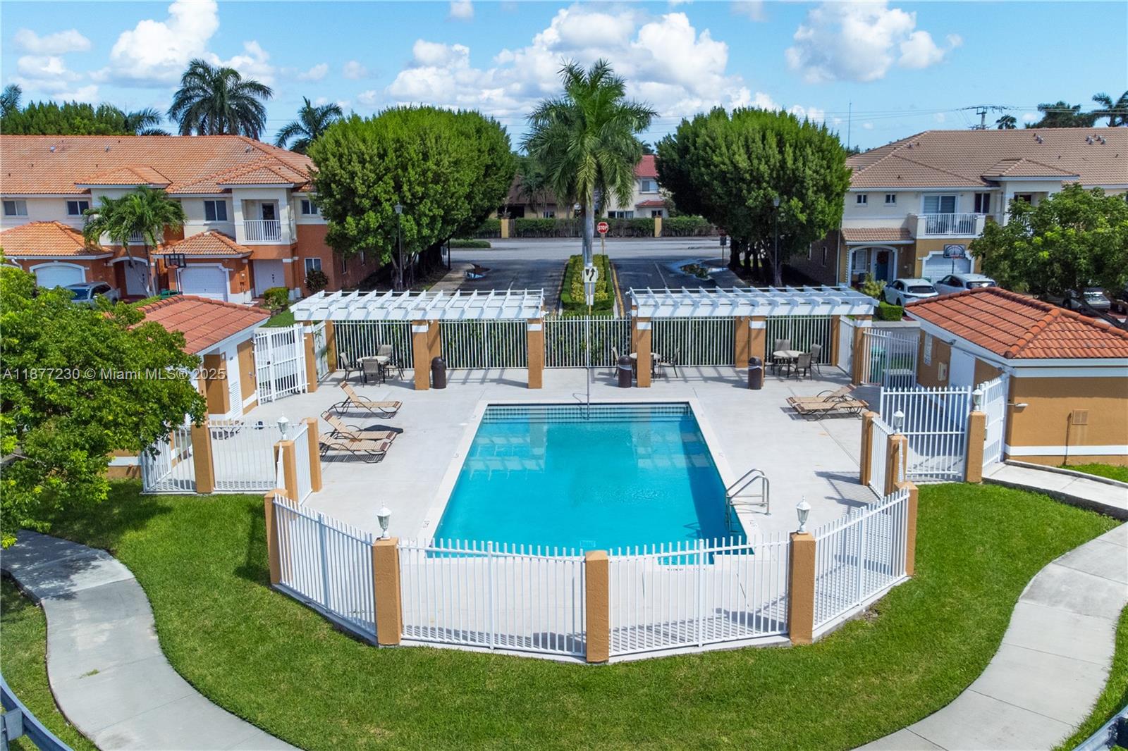 16256 Southwest 57th Lane Miami, FL 33193 - Photo 4 of 32 a view of a backyard with swimming pool